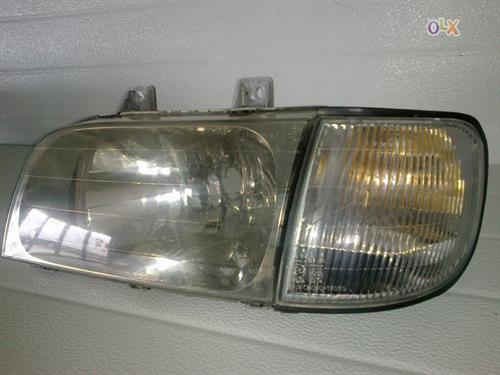 Peça - Farol e Pisca Esquerdo Kia Sportage - 1994 / 2005